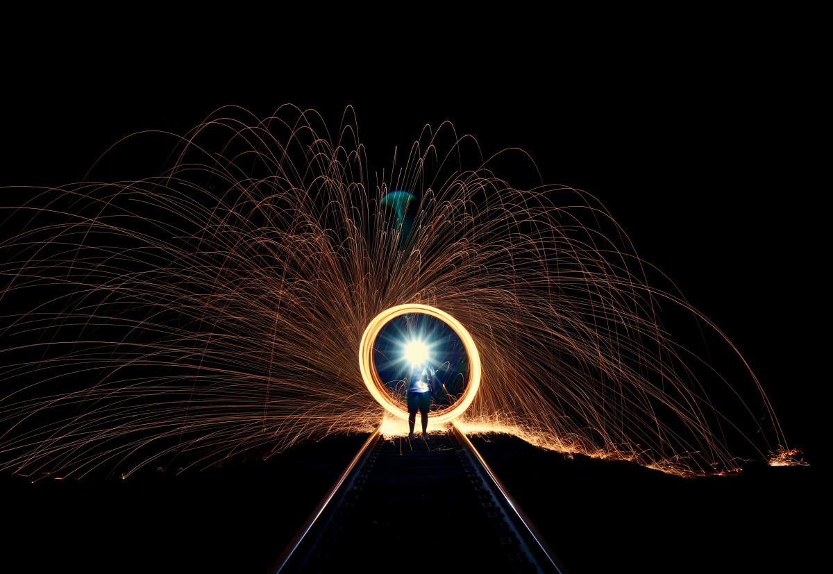 A circle of sparks on a main road