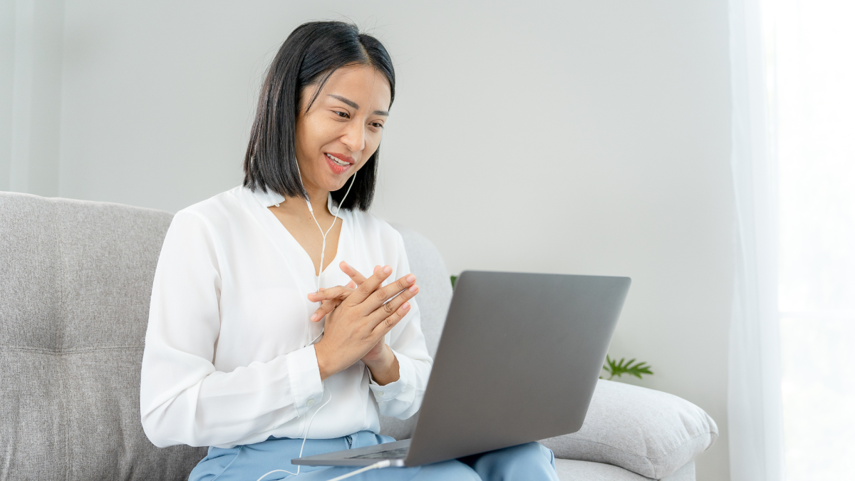 Young girl with white shirt in video conference