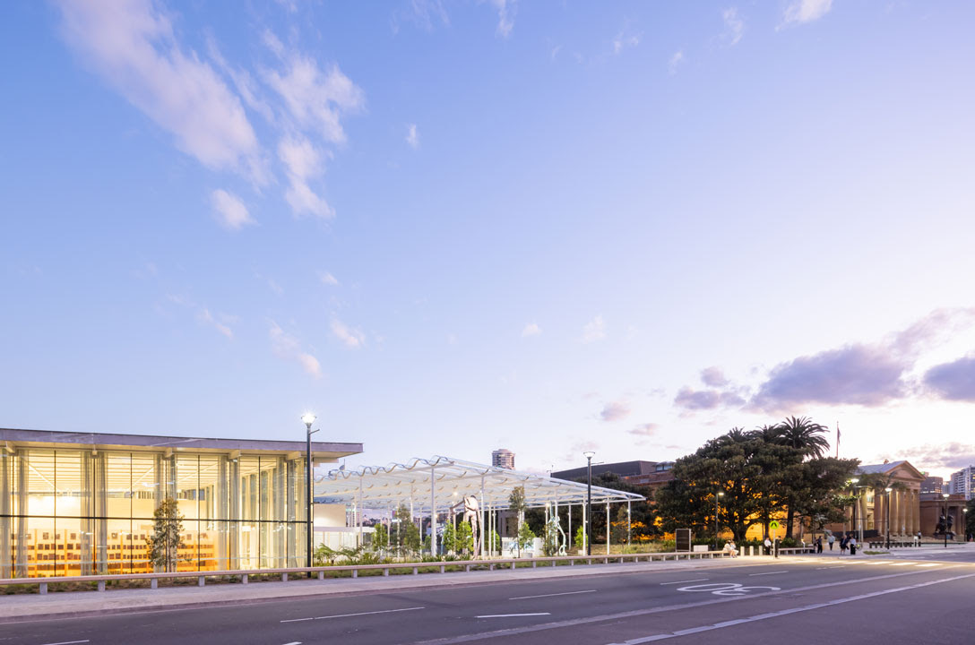 Exterior view of art building with clear blue sky. AGNSW