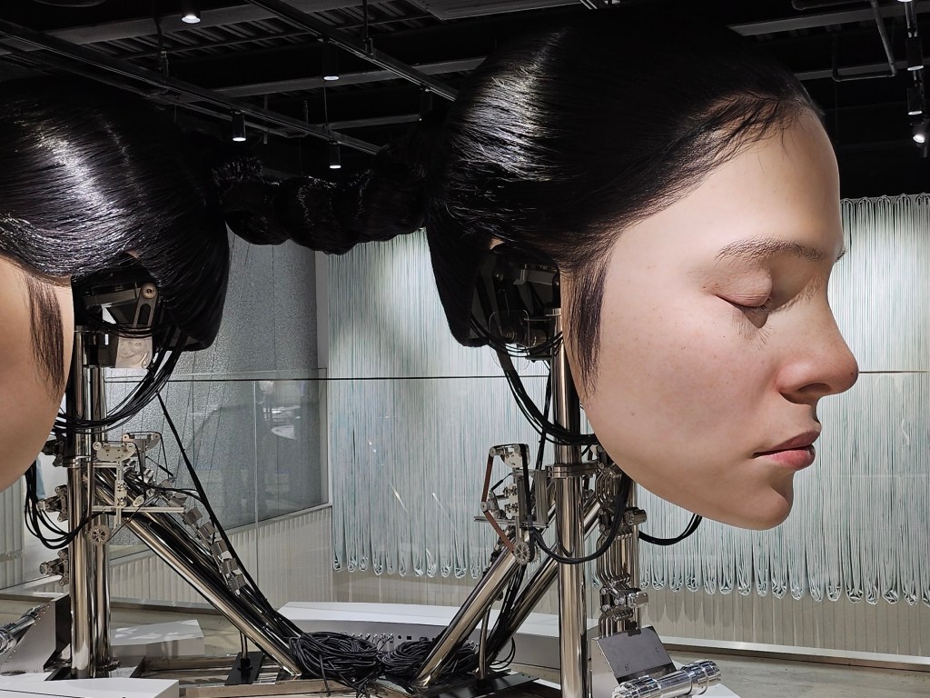 Two moving hyperrealistic robotic heads at Haus Nowhere by Gentle Monster, Shanghai. Photo: ArtsHub. 