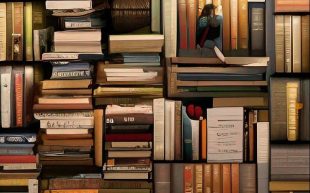 BookPeople centenary. Image is piles and piles of books, filling the frame, some stacked horizontally and some vertically.