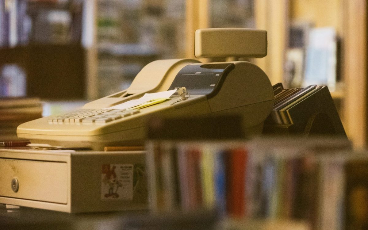 Small Press Network. Image is a cash register in a bookshop.