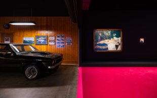 Why is a Holden Torana next to a Henry Ottmann? Image: 'Namedropping' installation view at Mona. Photo: Mona/Jesse Hunniford. A car and a painting sit in juxtaposition across two starkly different exhibition spaces.