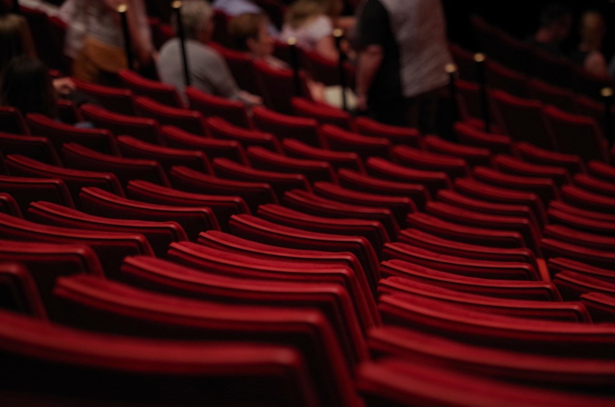 A theatre with empty seats, positioned here to denote the Australian theatre industry and performing arts sustainability.