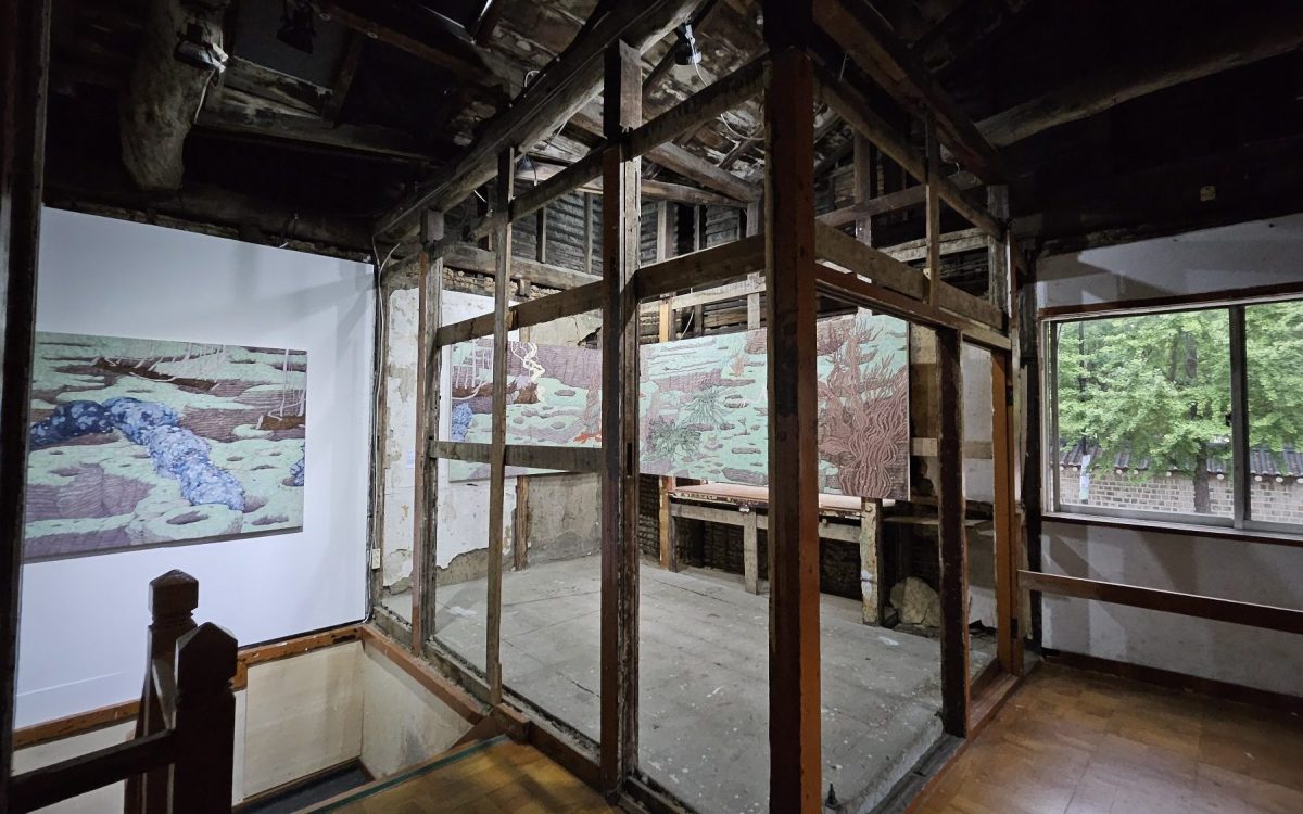 'Platypuses and Unicorns', installation view at BOAN1942, Seoul. Several paintings installed inside a traditional Korean resident that appears abandoned.