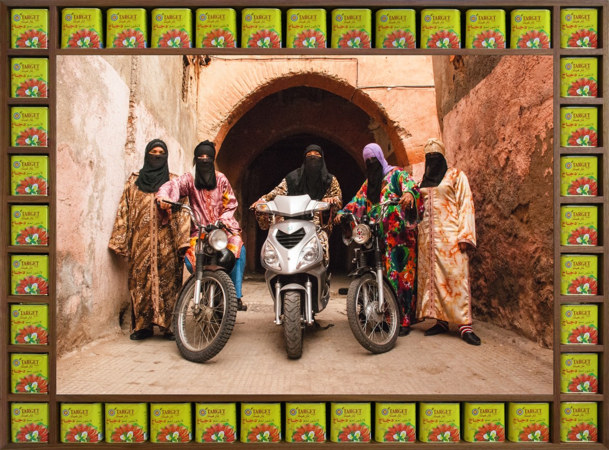 Image of African women wearing veils and bright patterned clothing on motobikes. Hassan Hajjaj.