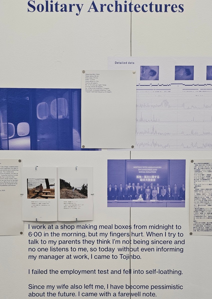 ‘Ministry of Loneliness’ with works by Rebecca Moccia for the Italy Pavilion, installation detail. A series of material gathered by the artist including photos of official meeting with ambassadors on loneliness and social isolation and a quote from one of Japan’s popular suicide sites which says, “I work at a shop making meal boxes from might to 6.00 in the morning, but my fingers hurt. When I try to talk to my parents they think I’m not being sincere and no one listens to me, so today without even informing my manager at work, I came to Tojinbo. I failed the employment test and fell into self-loathing. Since my wife also left me, I have become pessimistic about the feature. I came with a farewell note.”