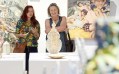 Two women in gallery looking at ceramic artwork. Muswellbrook prize