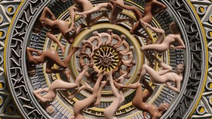 Naked human bodies are arranged in a spiral formation in 'XYXXY.'