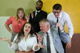 The cast of 'Classifried': two women and three men are emoting and gesticulating.