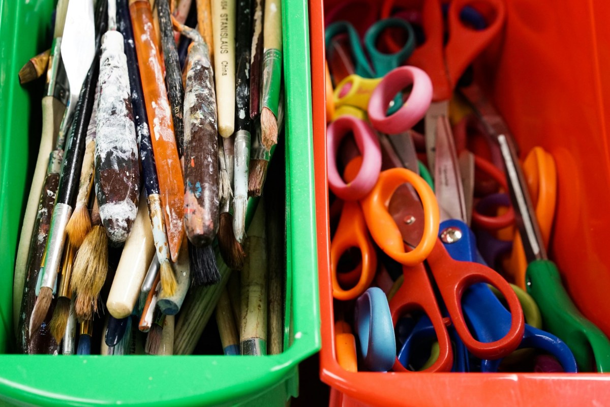 art materials - box of paintbrushes and box of scissors. Workshops.