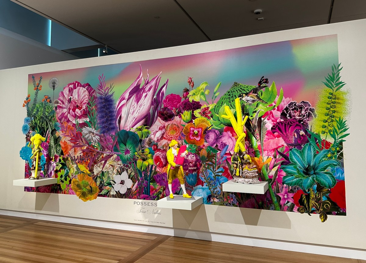 Brightly coloured art installation with wall mural and sculptural figurines. Joan Ross