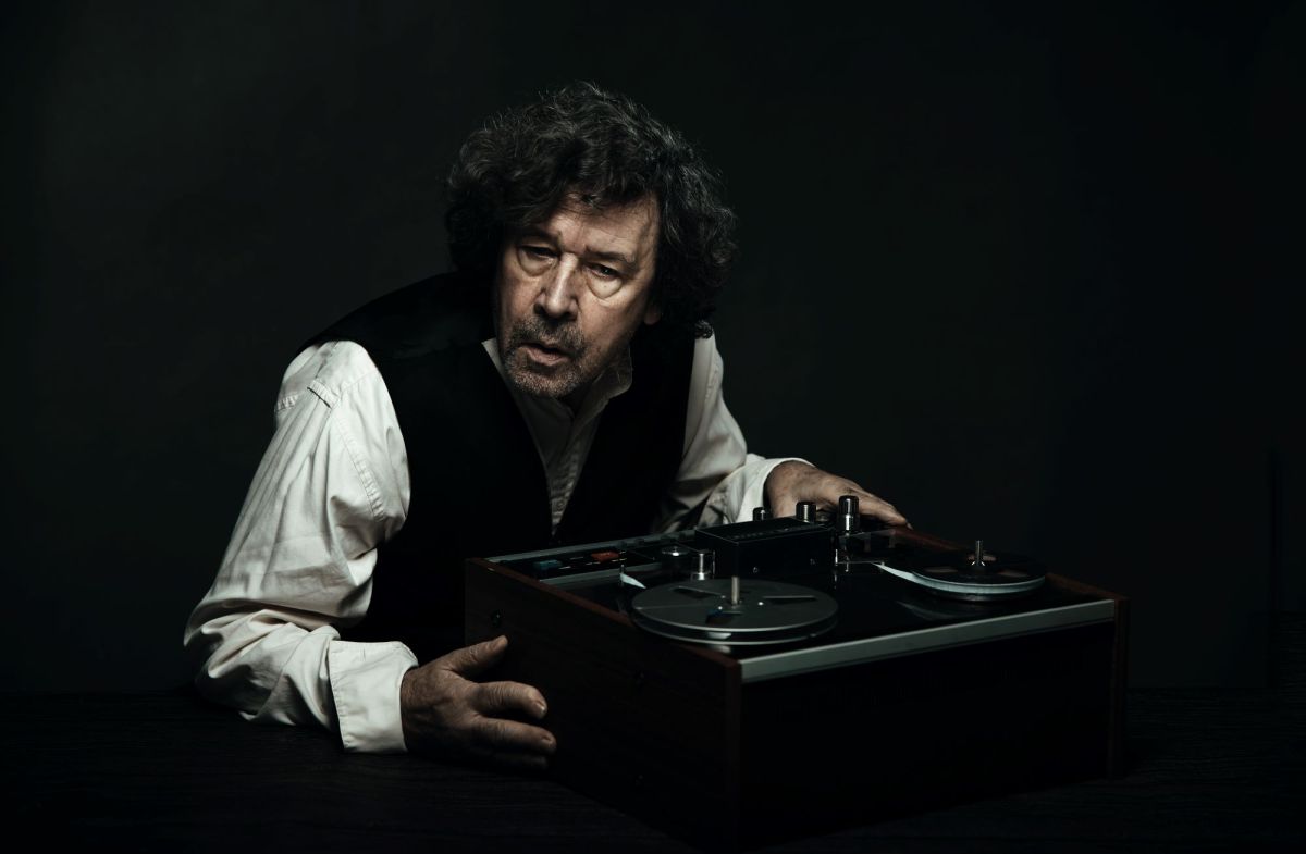 Stephen Rea in 'Krapp's Last Tape', one of many international productions in the 2025 Adelaide Festival. The lugubrious, lined, character-rich face of Irish actor Stephen Rea, who sits at a table bearing an old-fashioned reel-to-reel tape recorder.