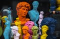 Colourfully rendered collection of sculptured busts. Arts news.