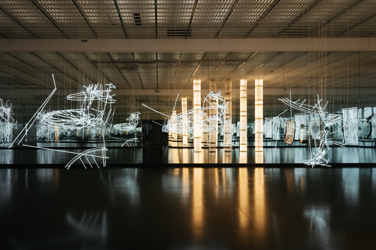 exhibition view with light sculptures. Cerith Wyn Evans.