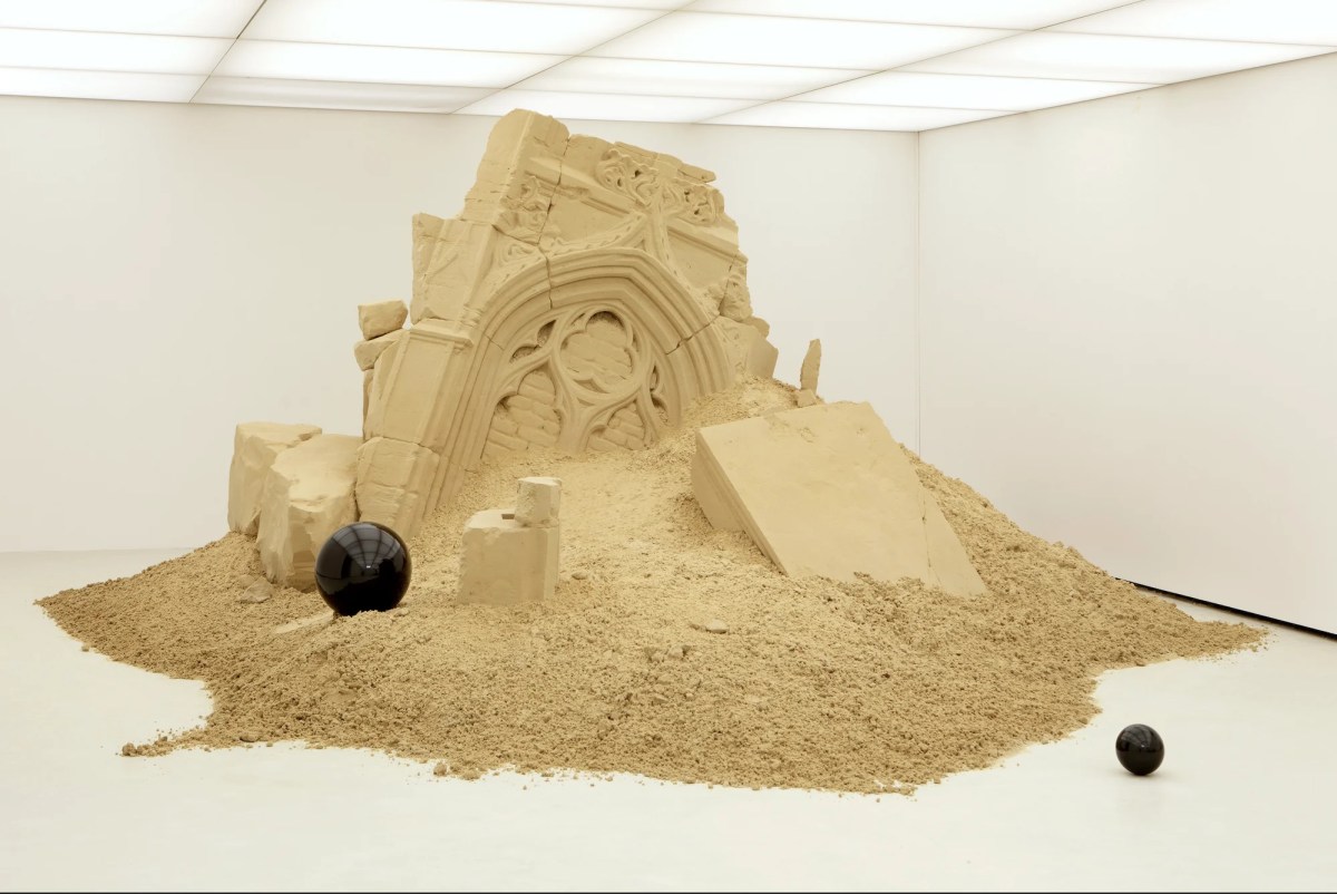 Sculpture made of sand in white gallery space. Theo Mercier