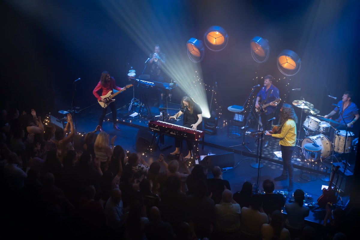 Tim Minchin and band perform in 'Tim Minchin – First at the Foundry' at the opening night of the Foundry Theatre, Sydney, Tuesday 11 February 2025. Minchin, barefoot and dressed in black, plays a keyboard; his five-strong band are visible behind him.