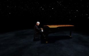 Ryuichi Sakamoto in mixed-reality, ‘KAGAMI’. A virtual image of Sakamoto playing a black grand piano in a limbo or dark virtual space.