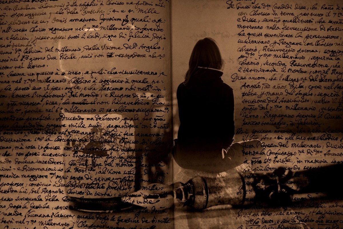 Silhouette of a woman against a faded manuscript filled with calligraphic writing.