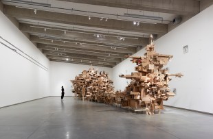 Isabel & Alfredo Aquilizan, 'REFLECTIONS/HABITATIONS', 2025. Installation view, 'Thinking together: Exchanges with the natural world', Bundanon, 2025. A large sculpture made from recycled cardboard in minimal gallery setting. Aquilizan